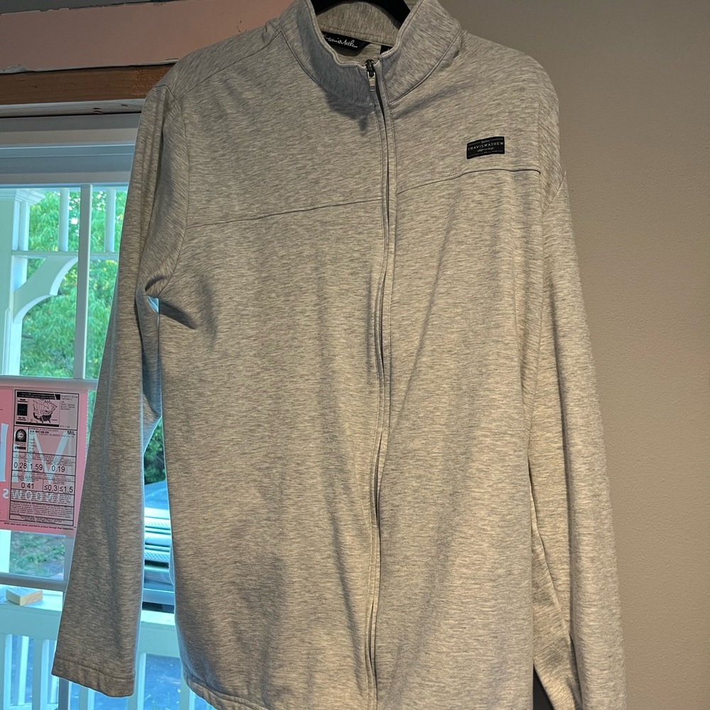 Travis Matthew zip up, grey, size large.